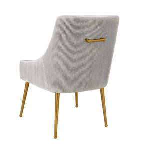 Gray chair with gold handle