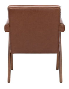 Mid century upholstered arm chair in cognac leatherette